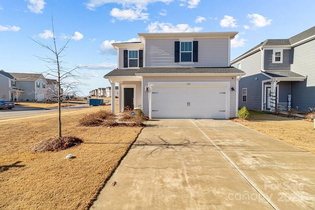 front of property featuring a garage