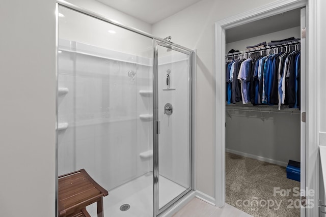 bathroom featuring walk in shower