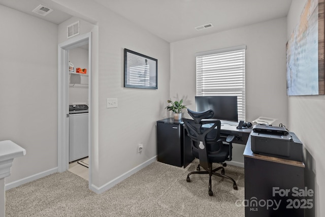 carpeted office with washer / clothes dryer