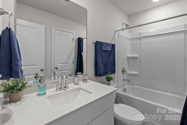 full bathroom featuring shower / bath combo, toilet, and vanity