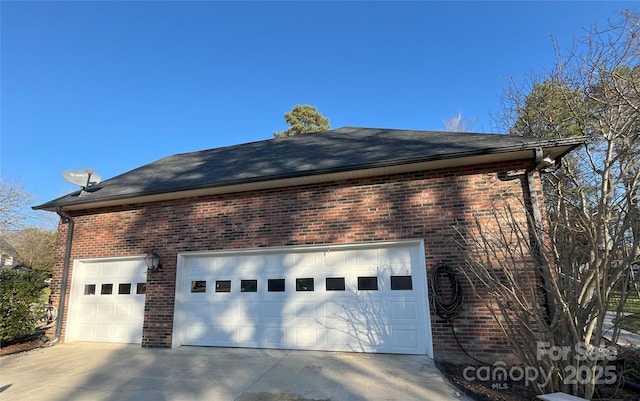 view of property exterior featuring a garage