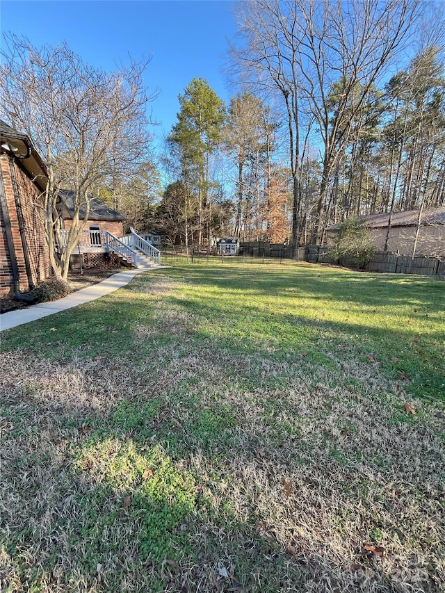 view of yard featuring a deck