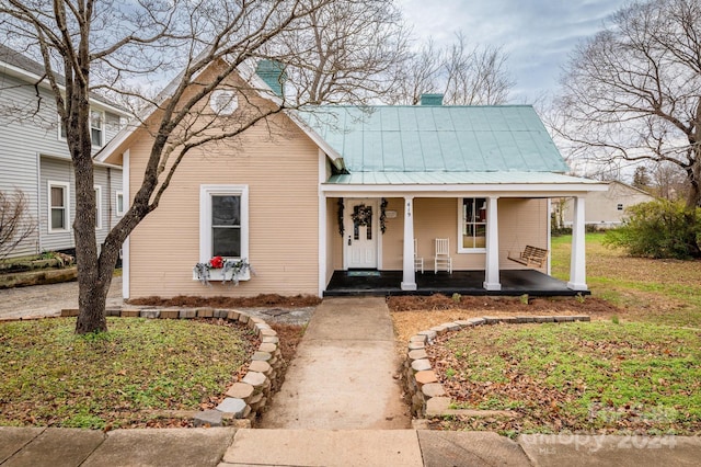 view of front of home featuring covered porch