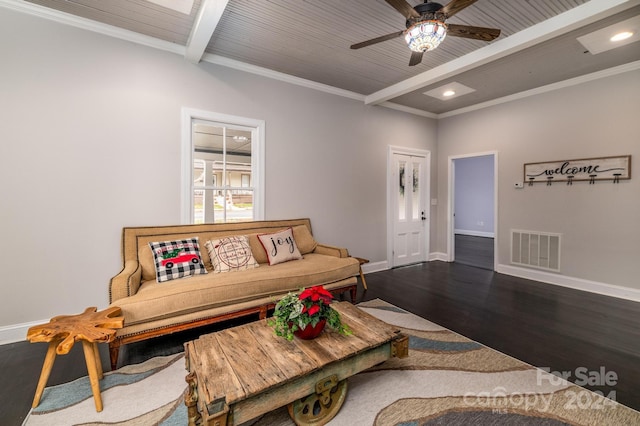 living room with ornamental molding, ceiling fan, beam ceiling, wood-type flooring, and wooden ceiling