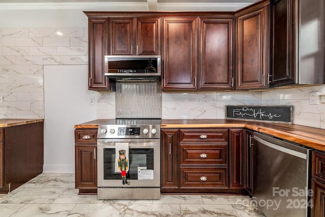 kitchen with decorative backsplash, fridge, stainless steel electric stove, and ornamental molding