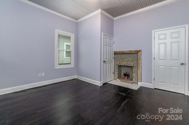 unfurnished living room featuring crown molding and dark hardwood / wood-style floors