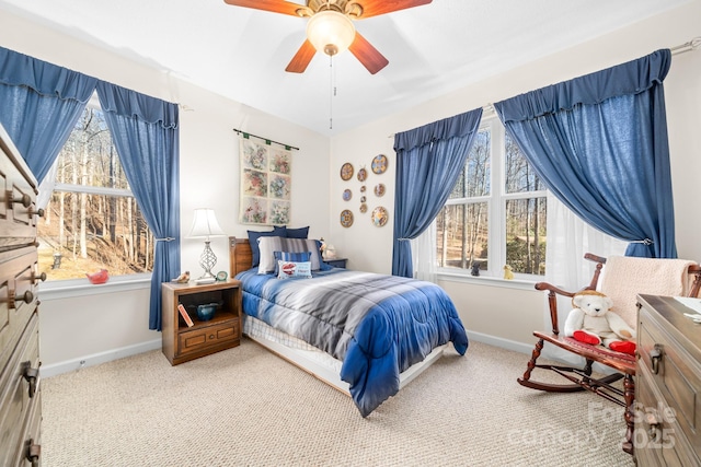 2959/2961 Bearwallow Mountain Rd, Hendersonville, NC 28792 - bedroom featuring ceiling fan, light carpet, and multiple windows