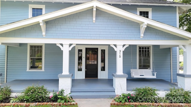 entrance to property with covered porch