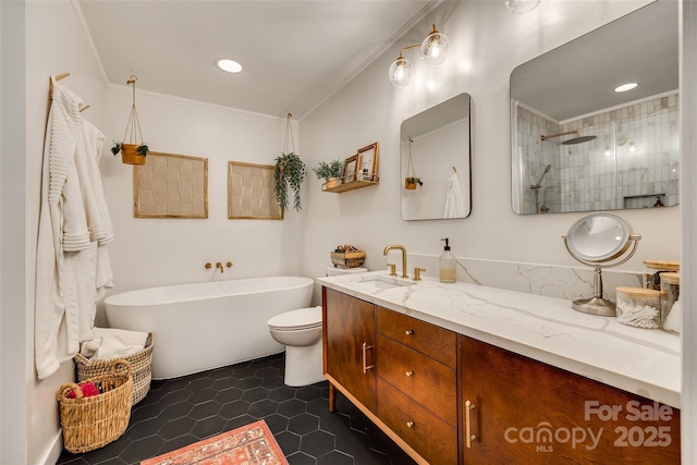 full bathroom with ornamental molding, vanity, toilet, and independent shower and bath