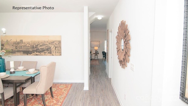 corridor featuring hardwood / wood-style flooring