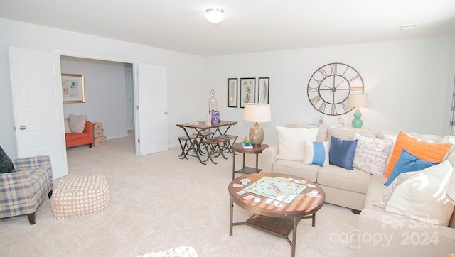 living room featuring light carpet