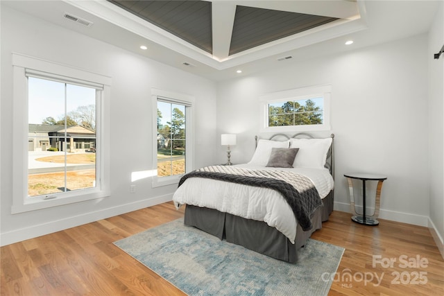 bedroom featuring wood-type flooring