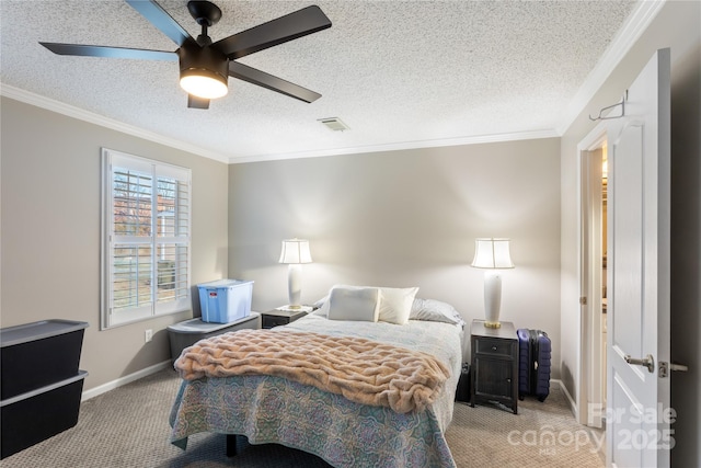 carpeted bedroom with a textured ceiling, ceiling fan, and ornamental molding