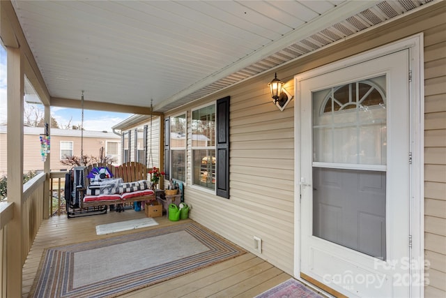 deck featuring a porch