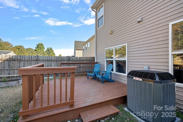 wooden deck with central AC unit