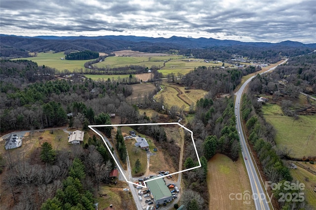 aerial view with a rural view and a mountain view