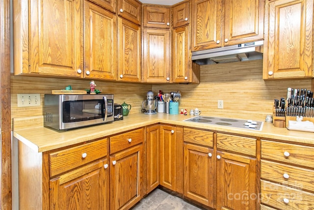 kitchen with white electric cooktop