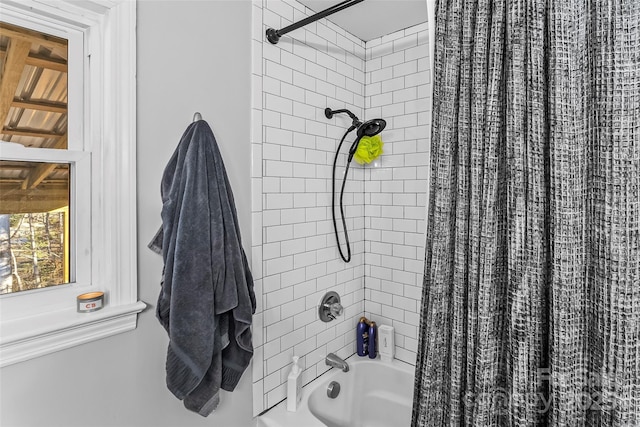 bathroom featuring shower / bath combination with curtain