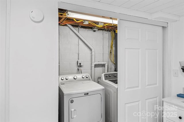 washroom featuring separate washer and dryer