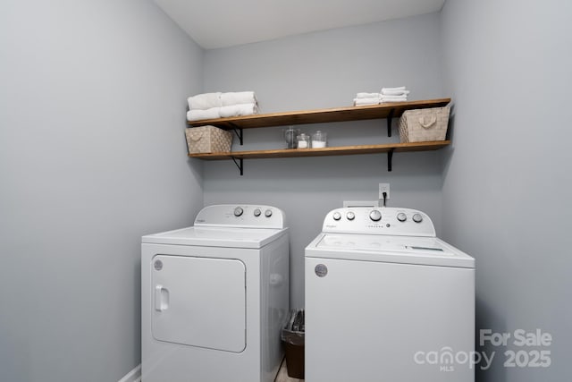 laundry room featuring separate washer and dryer