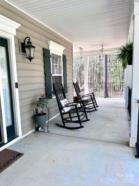 123 Kingfisher Dr, Mooresville, NC 28117 - view of patio featuring covered porch