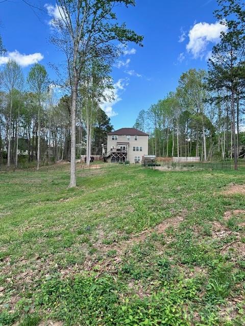 123 Kingfisher Dr, Mooresville, NC 28117 - view of yard with a wooden deck