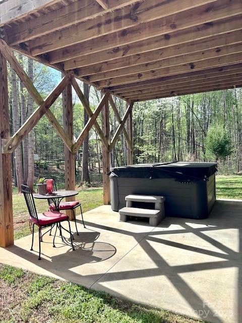 123 Kingfisher Dr, Mooresville, NC 28117 - view of patio featuring a hot tub