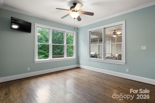 empty room with hardwood / wood-style flooring, ceiling fan, and ornamental molding