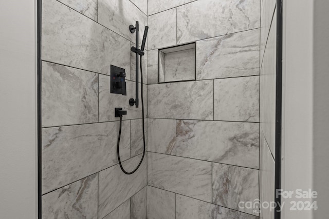 details featuring a tile shower