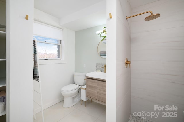 full bath with a tile shower, tile patterned flooring, toilet, and vanity