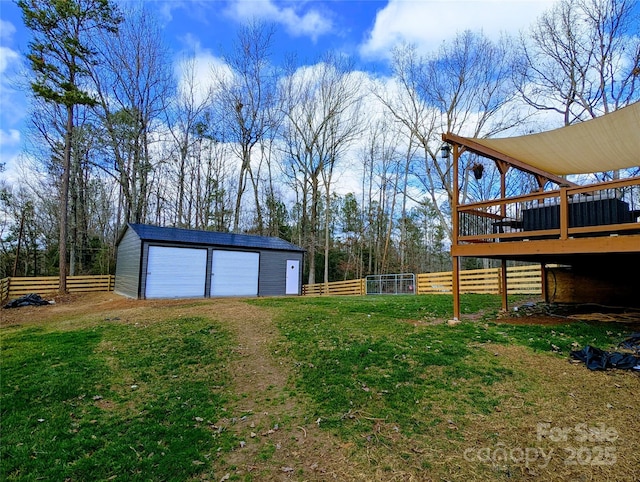 view of yard with an outbuilding and a deck