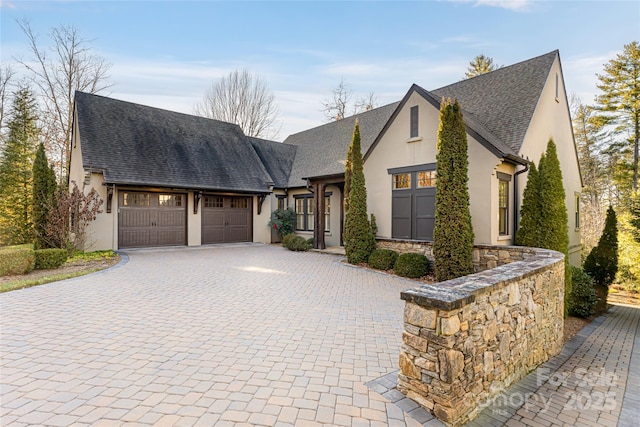 view of front of property featuring a garage