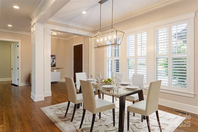 dining space featuring an inviting chandelier, baseboards, dark wood-style floors, and visible vents