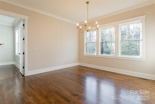 empty room featuring baseboards, an inviting chandelier, visible vents, crown molding, and dark wood-type flooring