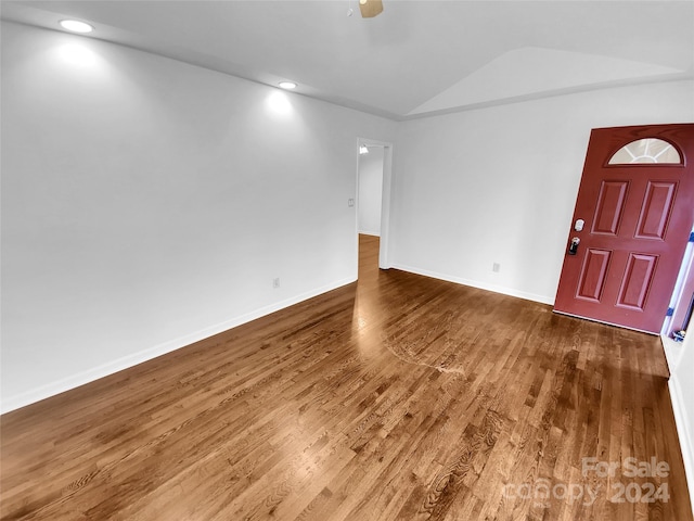 entryway with hardwood / wood-style floors, ceiling fan, and lofted ceiling