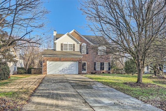 view of front facade featuring a front yard and a garage