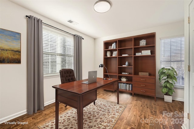 office area featuring dark wood-type flooring