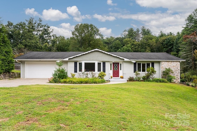 ranch-style home with a garage and a front lawn