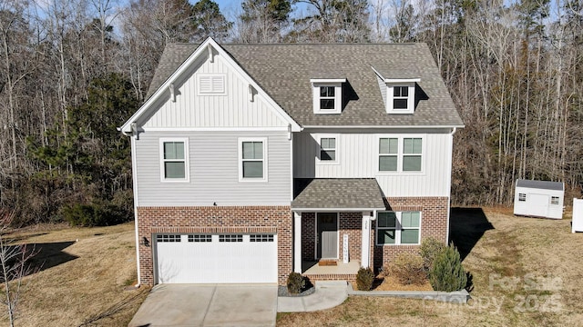 view of front of house with a front lawn and a garage