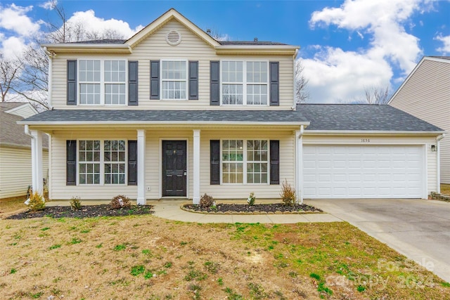 front of property featuring a garage