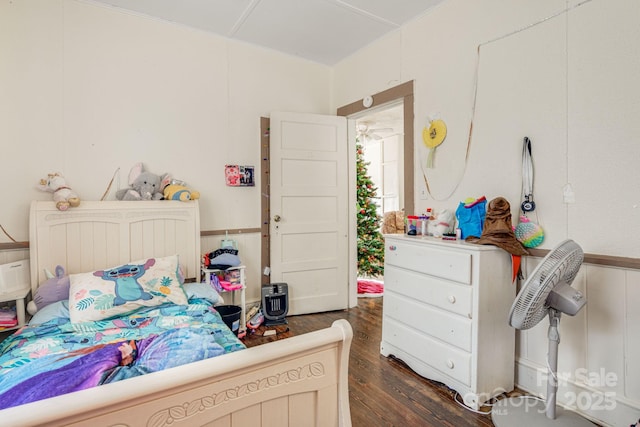 bedroom featuring dark hardwood / wood-style floors