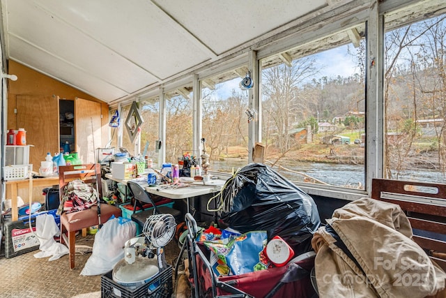 sunroom / solarium with lofted ceiling