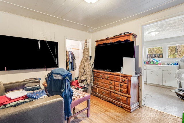 bedroom featuring a closet and light hardwood / wood-style floors