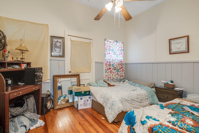 bedroom featuring wood-type flooring and ceiling fan