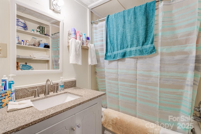 bathroom featuring vanity and walk in shower