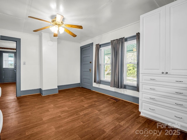 unfurnished room featuring hardwood / wood-style floors and ceiling fan