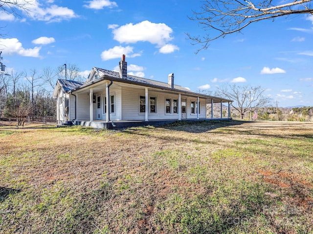exterior space with a yard