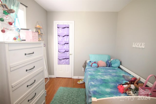 bedroom featuring light hardwood / wood-style flooring