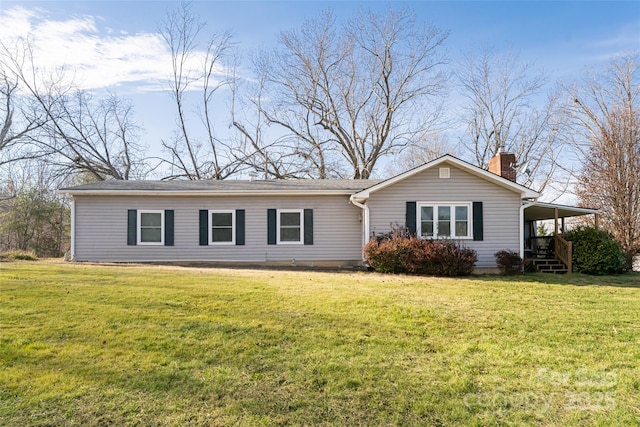 ranch-style home featuring a front lawn