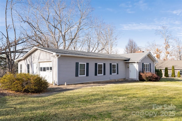 single story home with a front yard and a garage